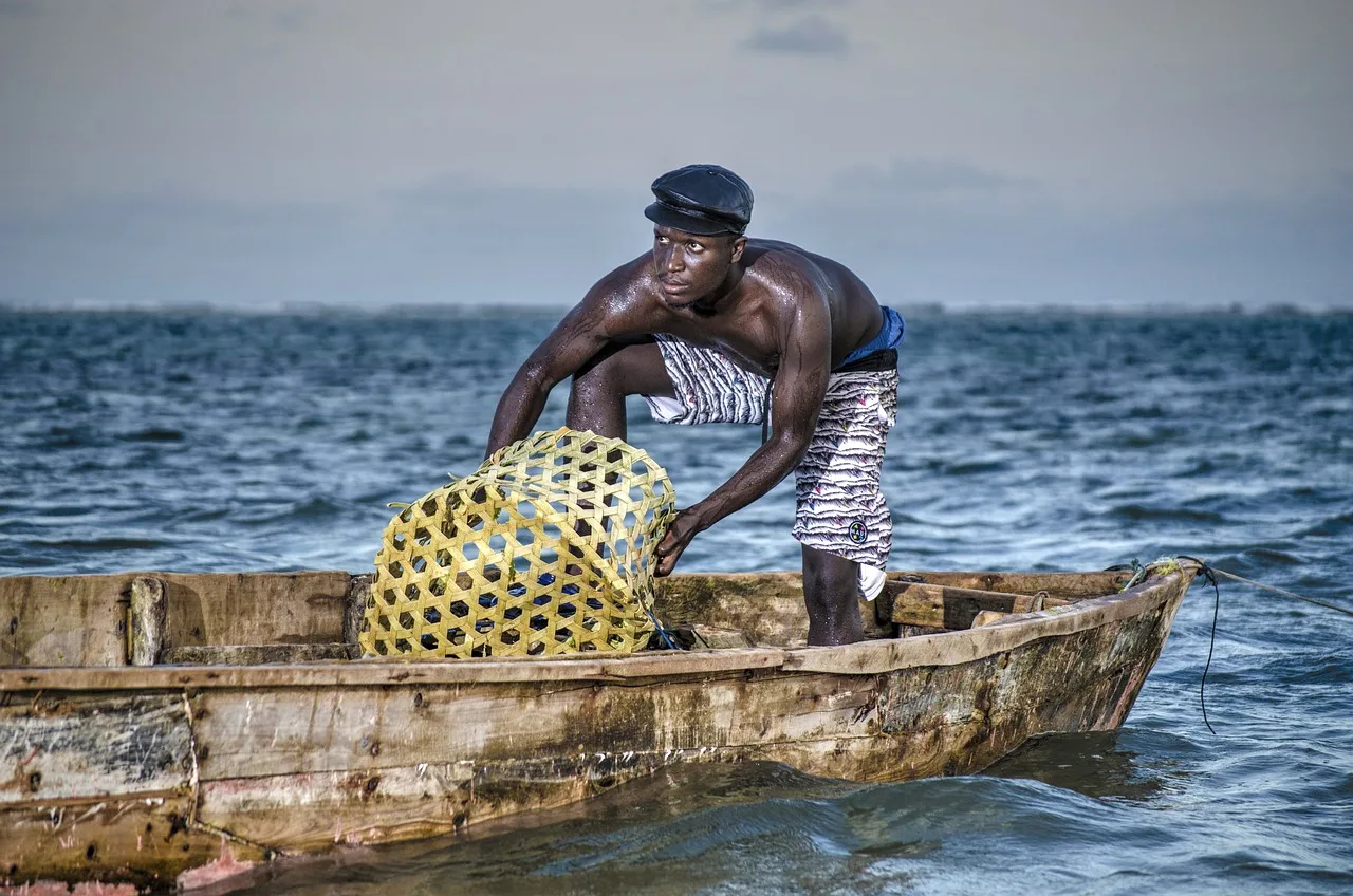The coast. Image of Fisherman fishing in Kilifi. 