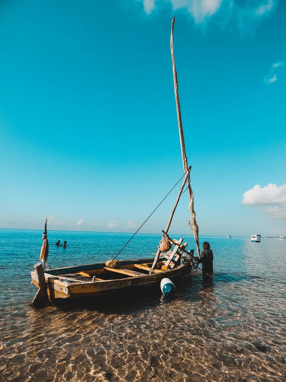 The coast. Image of a boat on the beach of Mombasa.